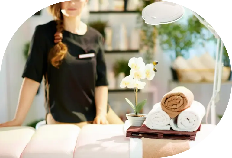 ręczniki i łóżko do masażu